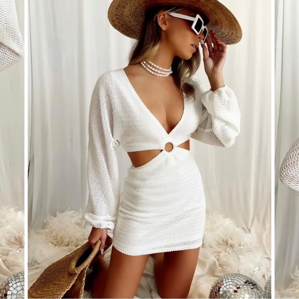Brand new cutout long sleeve dress.